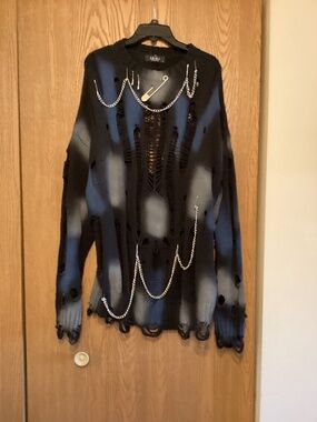 Akira “all torn up” oversize sweater with chain detail tunic length for women